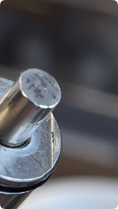 Panthera MK1 valve pin with visible deformation at the struck end